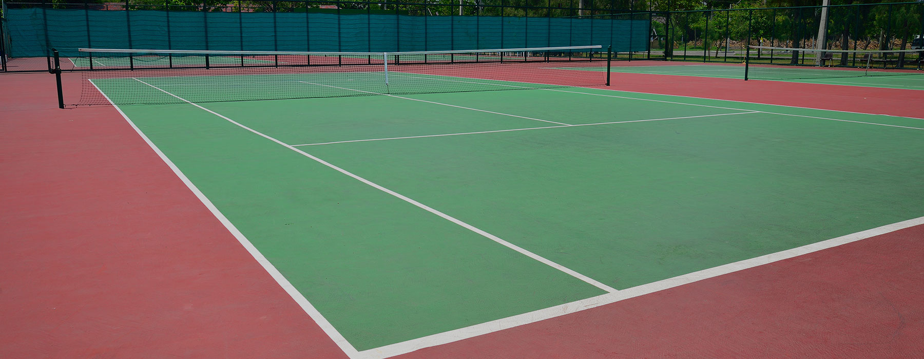 Building a tennis court by Top Court UK Ltd